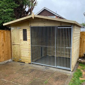Wooden dog kennel and run with window